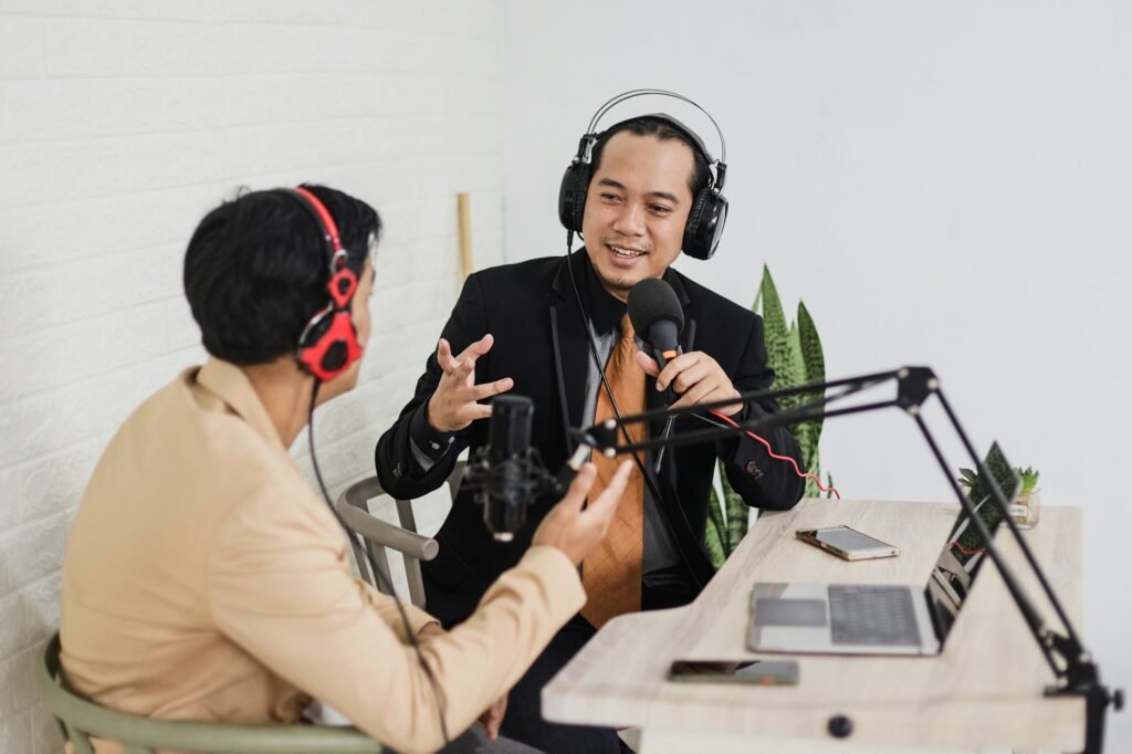 Radio host interview businessman at podcast studio